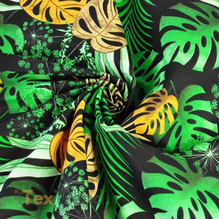 Baumwolle 100% Monstera-Blätter gelb-grün auf schwarzem Hintergrund  