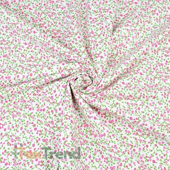 100% Baumwolle - grün-rosa Wiese auf weißem Hintergrund  