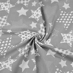 Baumwolle 100% gemusterte Sterne auf grauem Hintergrund  