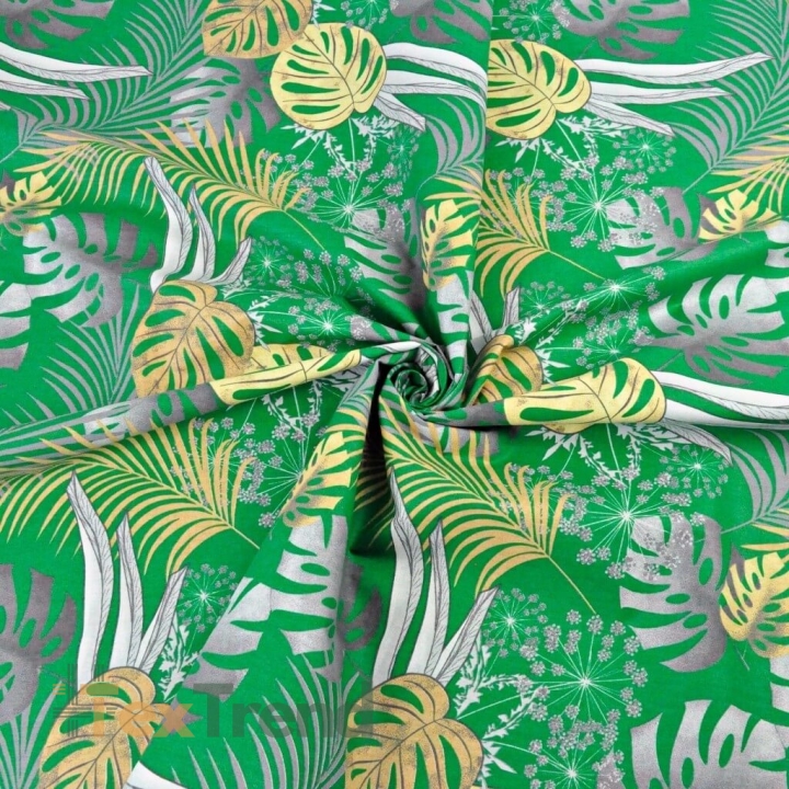 Baumwolle 100% Monstera-Blätter gelb-grau auf grünem Hintergrund  