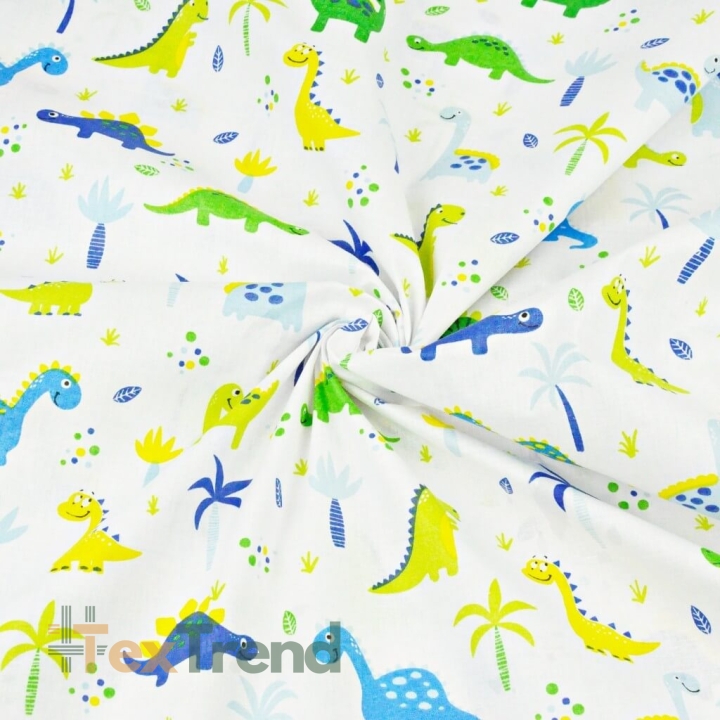 Baumwolle 100% Dinosaurier blau-grün mit Palmen auf weißem Hintergrund  