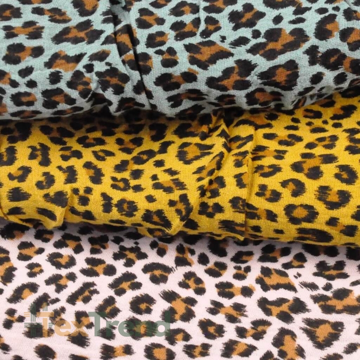 Baumwoll-Musselin plissiert Panther auf senfgelbem Hintergrund  