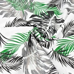 Baumwolle 100% Monstera-Blätter grün-schwarz auf weißem Hintergrund  