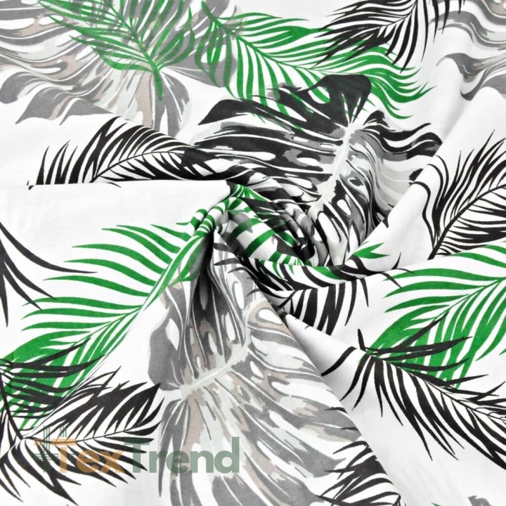 Baumwolle 100% Monstera-Blätter grün-schwarz auf weißem Hintergrund  