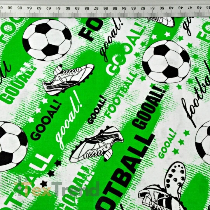 Baumwolle 100% Fußball auf grünem Hintergrund  