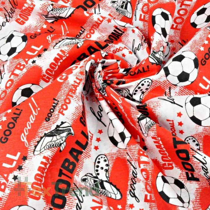 Baumwolle 100% Fußball auf rotem Hintergrund  