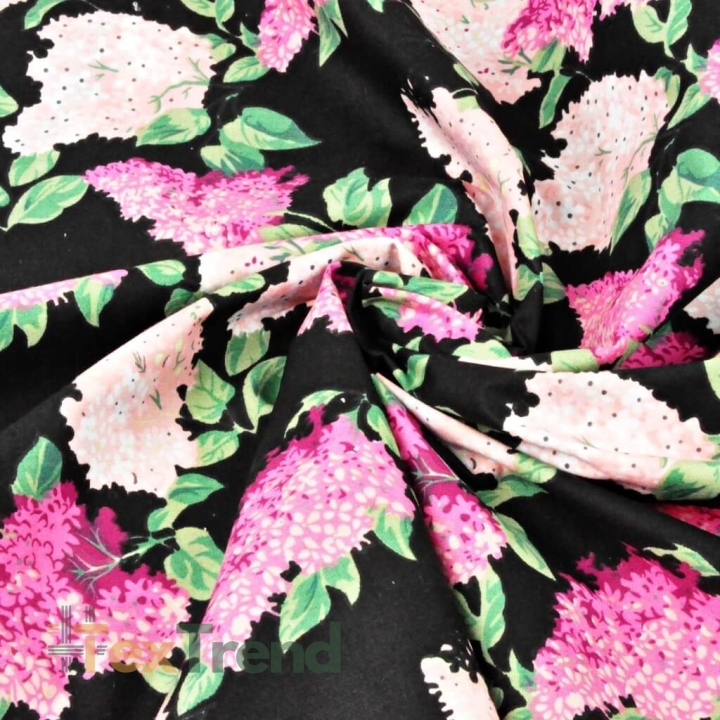 Baumwolle 100% Fliederblüten rosa-fuchsia auf schwarzem Hintergrund  