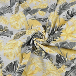 Baumwolle 100% goldene grafitblätter auf grauem Hintergrund  