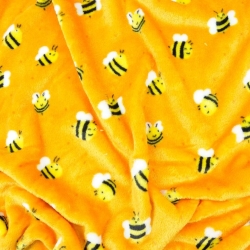 Fleece mit Bienen auf orangefarbenem Hintergrund  