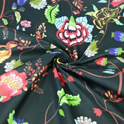 Baumwolle 100% Bunte Ranken auf schwarzem Hintergrund  