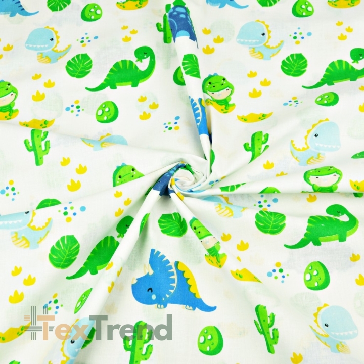 Baumwolle 100% Baby-Dinosaurier grün-blau auf weißem Hintergrund  