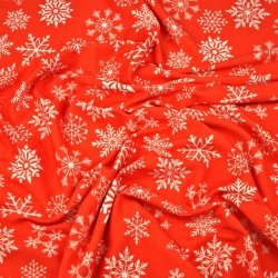 Jersey-Stoff weiße Schneeflocken auf rotem Hintergrund  