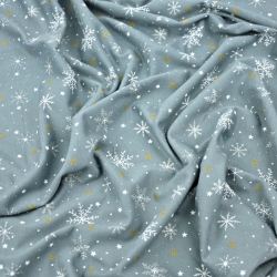 Jersey-Stoff weiße Schneeflocken mit goldenen Sternen auf grauem Hintergrund  