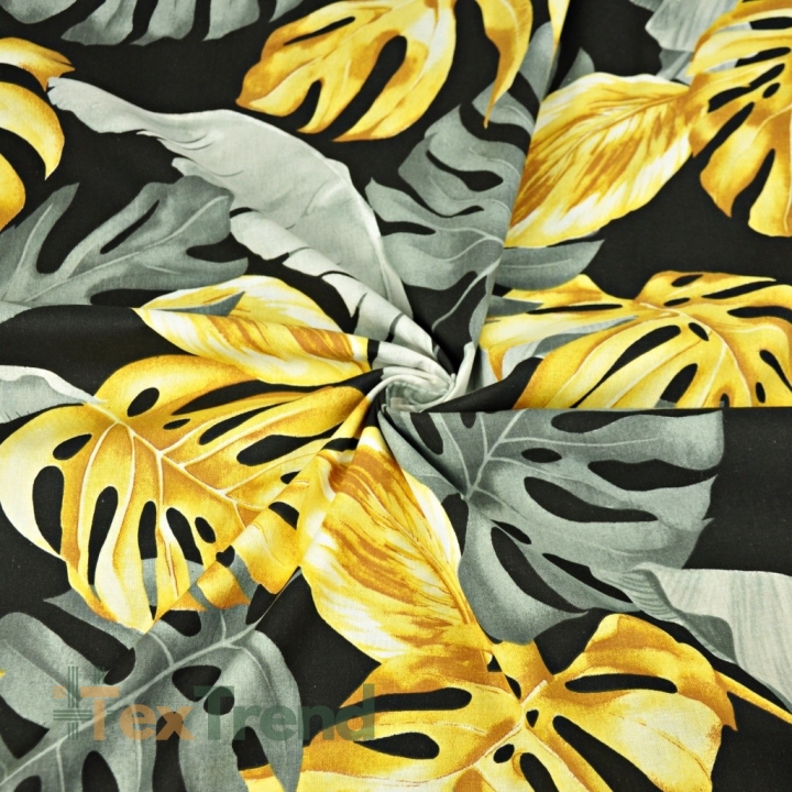 Baumwolle 100% Monstera- und Bananenblätter gold-grau auf schwarzem Hintergrund  