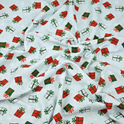 Jersey-Stoff grün-rote Geschenke auf hellblauem Hintergrund  