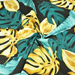 Baumwolle 100% Monstera- und Bananenblätter gold-türkis auf schwarzem Hintergrund  