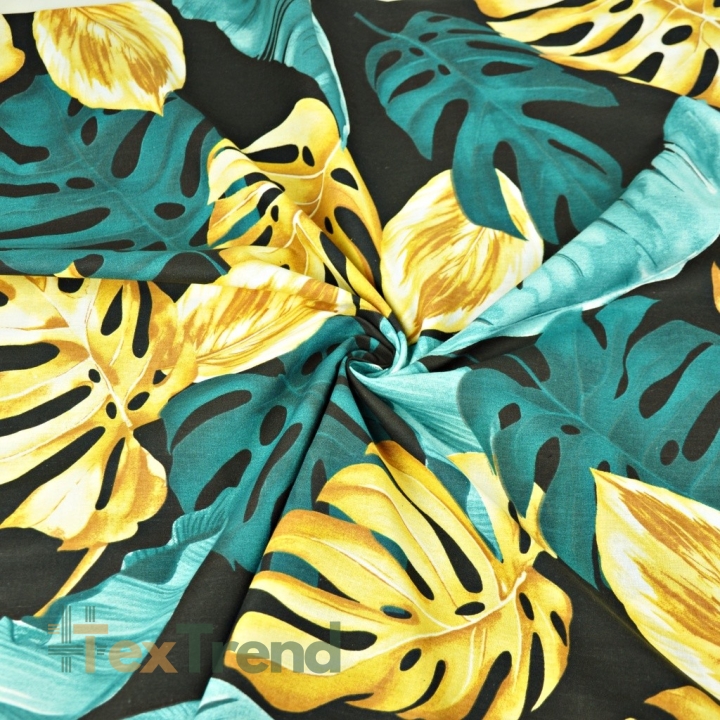 Baumwolle 100% Monstera- und Bananenblätter gold-türkis auf schwarzem Hintergrund  