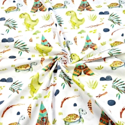 Baumwolle 100% Indianer-Dinosaurier in grün auf weißem Hintergrund  