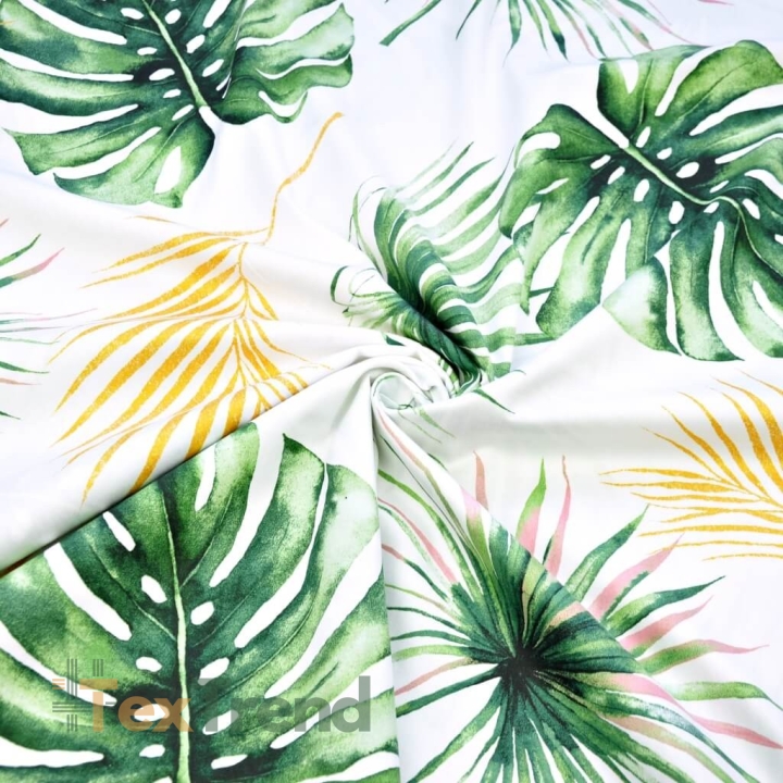 Baumwoll-Satin gemustert Monstera- und Palmenblätter vergoldet auf weißem Hintergrund  