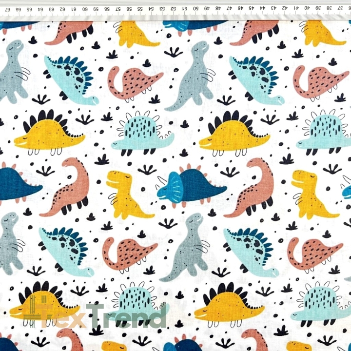 100% Baumwolle mit bunten Dinosauriern auf weißem Hintergrund  