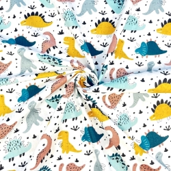 100% Baumwolle mit bunten Dinosauriern auf weißem Hintergrund  