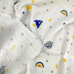 Musselin Double Gauze bedruckt mit Raketen und Planeten  