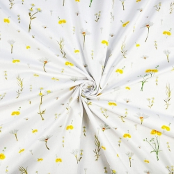 100% Baumwolle mit gelben Wiesenblumen auf weißem Hintergrund  