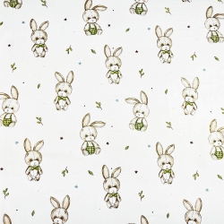 100% Baumwolle mit plüschigen Kaninchen auf weißem Hintergrund  