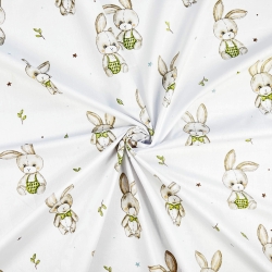 100% Baumwolle mit plüschigen Kaninchen auf weißem Hintergrund  