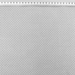 100% Baumwolle mit weißen Punkten auf grauem Hintergrund  