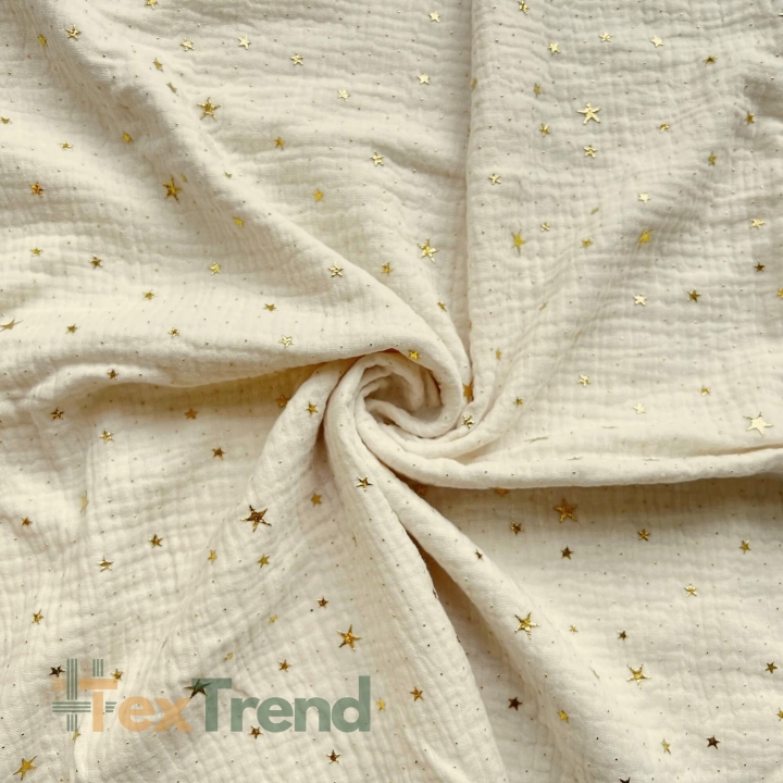Musselin double gauze ecru (Ivory) mit goldenen Sternen  
