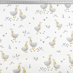 100% Baumwolle mit Gänsen und gelber Schleife auf weißem Hintergrund  