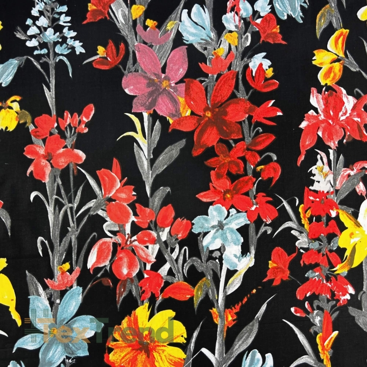 100% Baumwolle mit gelb-roten Blumen auf schwarzem Hintergrund  