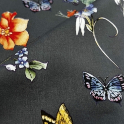 Baumwolle Satin gemustert Blumen orange auf graphitfarbenem Hintergrund  