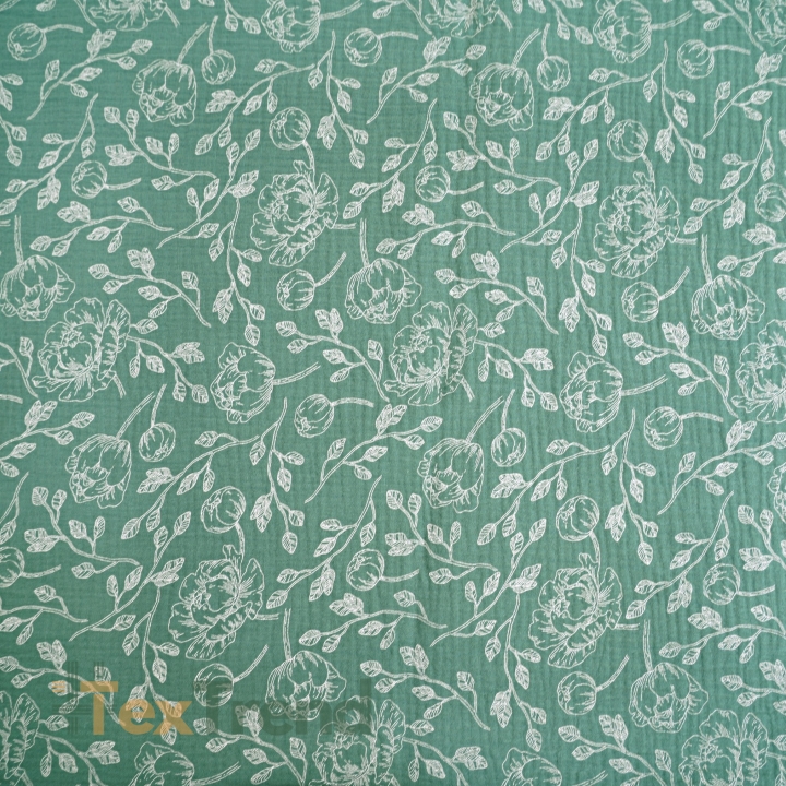 Muslin Double Gauze bedruckte Blumenumrisse auf salbeigrünem Hintergrund  