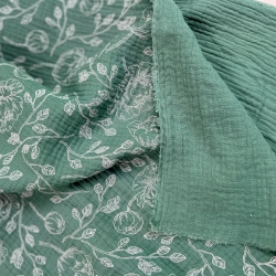 Muslin Double Gauze bedruckte Blumenumrisse auf salbeigrünem Hintergrund  