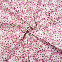 100% Baumwolle rosa Wiese auf weißem Hintergrund  