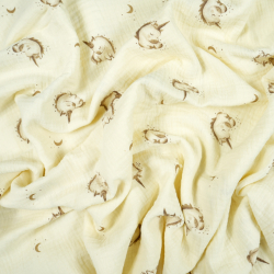 Doppel-Gaze mit Einhorn-Druck auf ecrufarbenem Hintergrund