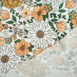 Bedruckter Double Gauze Musselin mit orange-grünen Blumen