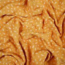 Doppelgaze mit Punkten auf senfgelbem Hintergrund