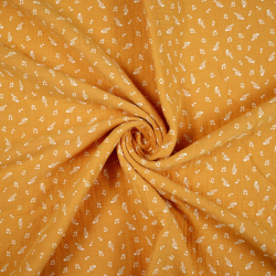 Doppelgaze mit Punkten auf senfgelbem Hintergrund