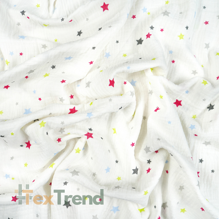 Bedruckter Double Gauze Musselin mit bunten Sternen