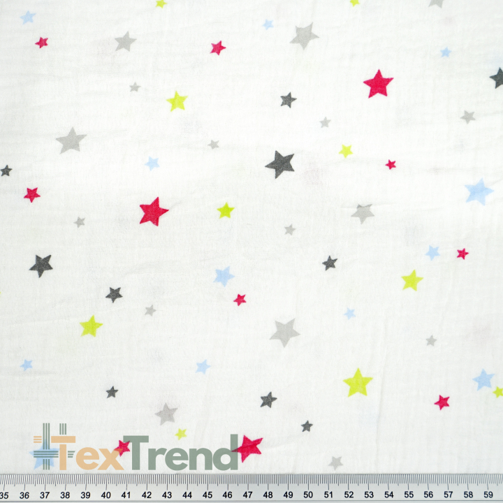 Bedruckter Double Gauze Musselin mit bunten Sternen