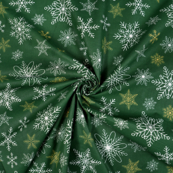 100% Baumwolle Weihnachtsmuster Schneeflocken gold-weiß auf grünem Hintergrund