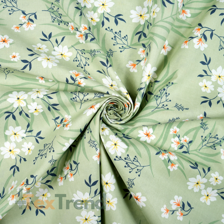 100% Baumwolle mit weißen Blumen auf pistaziengrünem Hintergrund - 220cm