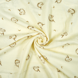 Doppel-Gaze mit Einhorn-Druck auf ecrufarbenem Hintergrund