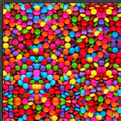 Baumwoll French Terry Stoff Digitaldruck - bunte Schokoladenbonbons