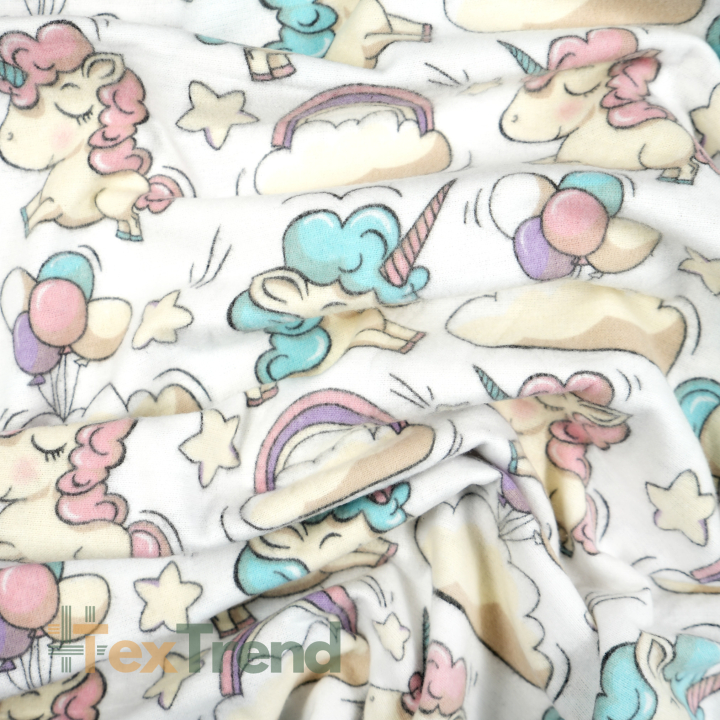 Flanellstoff / Baumwollflanell – weich – Einhörnern und Ballons auf weißem Hintergrund