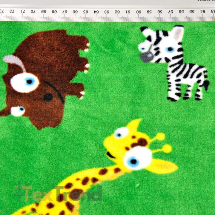 Kuschelfleece Stoff – Kinder Muster - afrikanische Tiere auf grünem Hintergrund