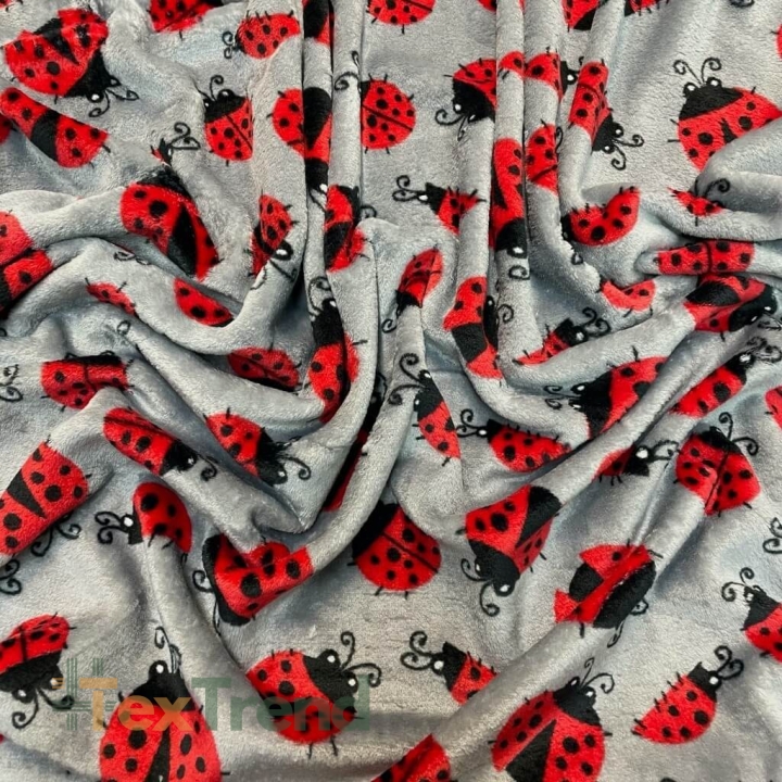 Kuschelfleece Stoff – Kinder Muster - rote Marienkäfer auf grauem Hintergrund